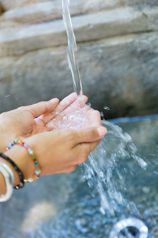 water-running-into-hands